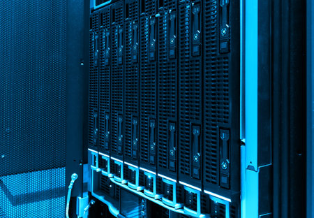 close-up of hard drives in modern data center. blue tone