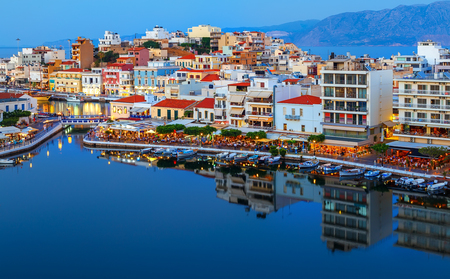 Agios Nikolaos at night. Crete, Greece. Agios Nikolaos is a picturesque town in the eastern part of the island Crete built on the northwest side of the peaceful bay of Mirabello.の写真素材