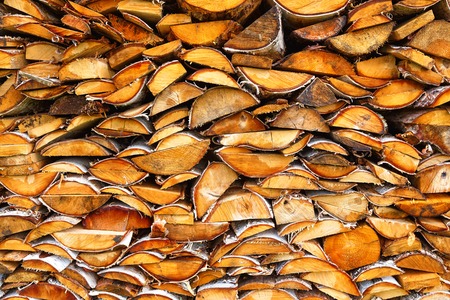 Stack of firewood - wooden abstract backgroundの写真素材