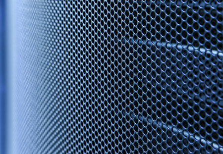 Door perforated of server rack cabinet. The key is inserted into the door lock. Side lighting and shallow DOFの写真素材