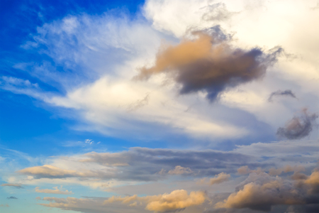 Evening Sky,Colorful Dark Blue and Amazing Dramatic Sunset sky on twilight with Storm Cloud,majestic fantastic sky nature background,idyllic sunlight on cloud fluffyの写真素材