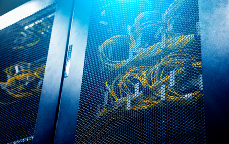 Looking through honeycomb pattern doors inside modern big data server rack in the data center with...
