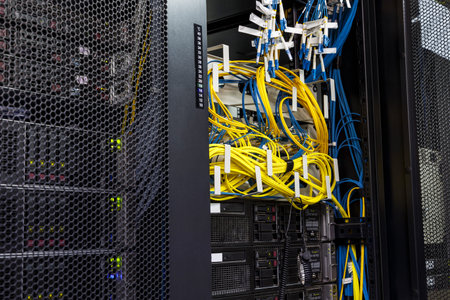 Technology network cable network server room routers with fusebox panel. Neatly twisted internet...
