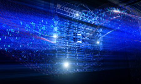 Blade server in rack cluster hard drives storage tapes with optic cables internet wires in internet datacenter room. Speed and faster digital matrix technology information. Motion binary blue toningの写真素材