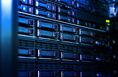 Close up server rack cluster in a data center selected focus, narrow depth fieldの写真素材