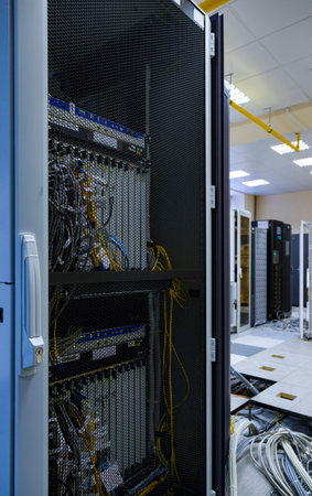 data center installation , open server rack door . Installation of new equipment , construction of...