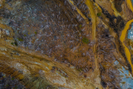 Pink colored water reservoir copper digging production site contamination territory ecological...