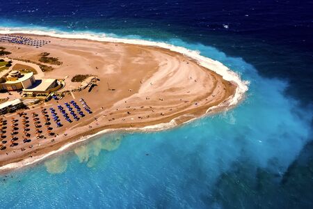 Aerial birds eye view photo taken by drone of Rodos island town, Elli beach, a popular summer tourist destination, Dodecanese, Aegean, Greeceの写真素材