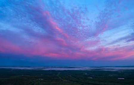 Low Cumulus cloud cover over forests swamps and fog. Khanty-Mansiysk. Western Siberia. Russia.の写真素材