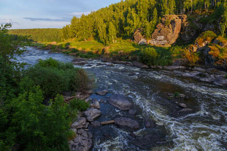 One of the popular tourist places near Yekaterinburg, the river Iset threshold revun, a close-up view of the whirlpools and the riverの写真素材