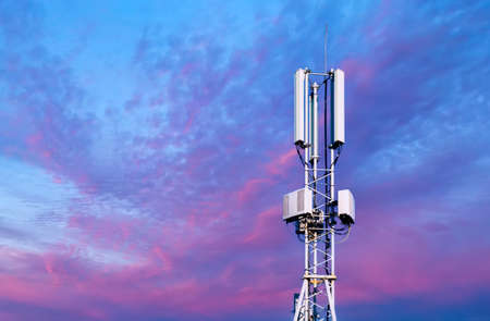 Telecommunication towers with Blue sky and white clouds background and textureの写真素材