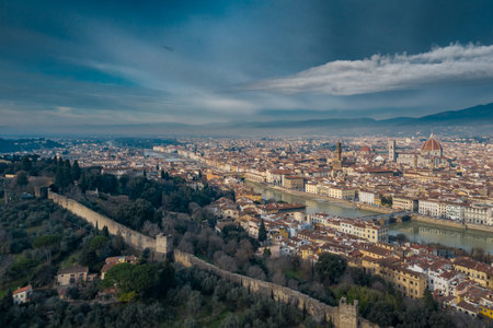 Aerial panorama of Florence at sunrise, Firenze, Tuscany, Italy, cathedral, river, drone pint view,...