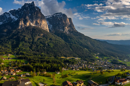 Aerial view of improbable peak of mountains of Dolomites at sunset, Italian Alps,drone view pointの写真素材
