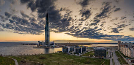 Russia, St.Petersburg, 06 May 2020: Aerial panoramic image of skyscraper Lakhta center at sunset, night illumination is on, It is the highest skyscraper in Europe, Completion of constructionのeditorial素材