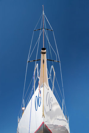Russia, St.Petersburg, 26 May 2020: Port Hercules, the sailboats stand on supports, the bottom view, masts and the slings, a clear sunny weather, the blue sky, the bottom of the boat and kielのeditorial素材
