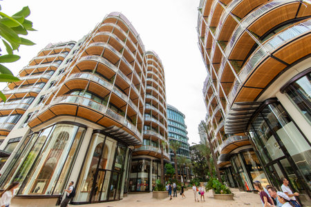 Monaco, Monte-Carlo, 09 July 2019: Facade of the new residential quarter of One, magnificent apartments, a foot zone with a large number magnificent branded shops and restaurants, place Casino, luxuryのeditorial素材