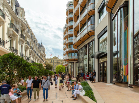 Monaco, Monte-Carlo, 09 July 2019: Facade of the new residential quarter of One, magnificent apartments, a foot zone with a large number magnificent branded shops and restaurants, place Casino, luxuryのeditorial素材