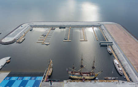 Russia, St. Petersburg, 14 October 2021: Aerial view of the new port Hercules with a replica of the old military frigate Poltava, the port next to the Lakhta center skyscraperのeditorial素材