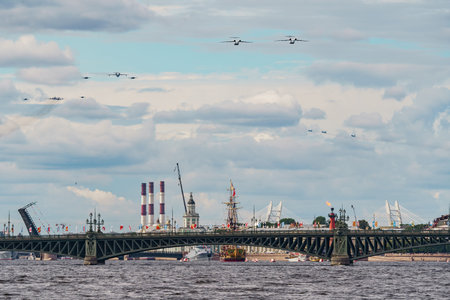 Russia, St. Petersburg, 28 July 2022: Military aircraft and helicopters of the air force fly on the...