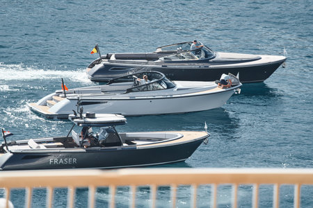 Monaco, Monte Carlo, 27 September 2022 - a boat with guests of yacht brokers departs from the shore...