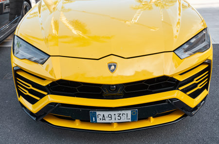 Monaco, Monte Carlo, 29 September 2022 - Close-up view of yellow sports car Lamborghini on streetのeditorial素材
