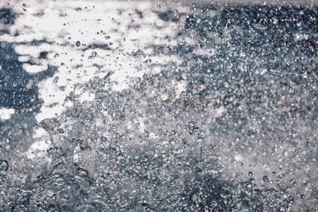 Sailing regatta in the Gulf of Finland at sunset, sailing yacht competing in a race, splashing water from under the boat, teamwork, board the boatの写真素材