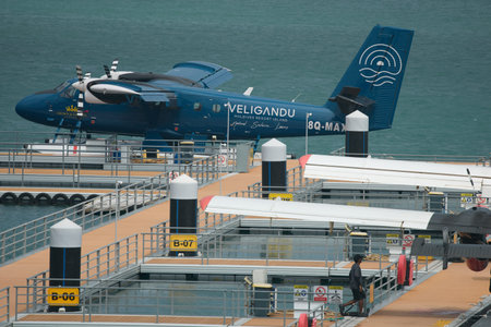 Male, Maldives island, 02 December 2024: water planes moored at the piers at the airport, logistics...