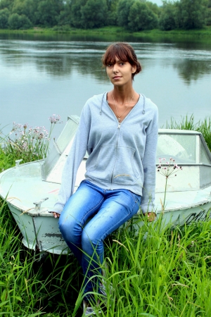 Girl on the boatの写真素材