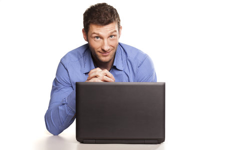 Attractive businessman With Laptop, On White Background