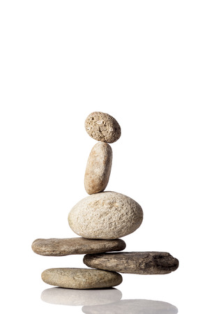 Balanced stack of different river stonesの写真素材