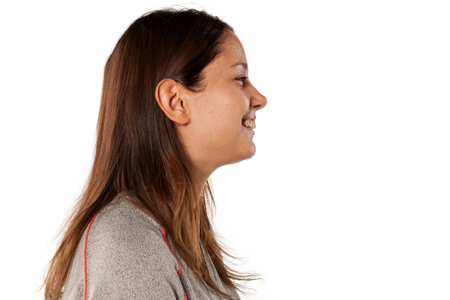 profile of young beautiful woman with long hair and without makeup