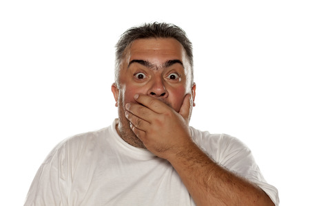 obese shocked man on a white backgroundの写真素材
