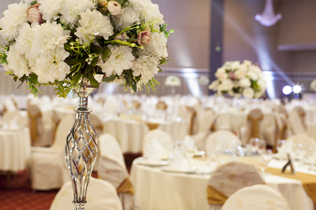 luxury decorated tables in the wedding hallの写真素材