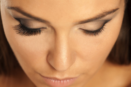 female eye with and without lash extensionの写真素材