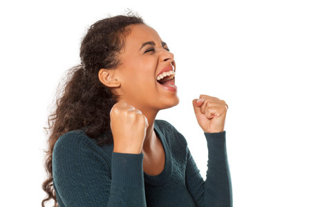 portrait of young beautiful happy dark-skinned woman on a white background