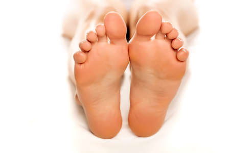 closeup of female sole feet, on white backgroundの写真素材