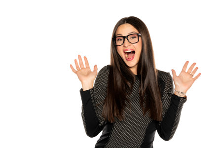 Happy young woman with glasses on white background