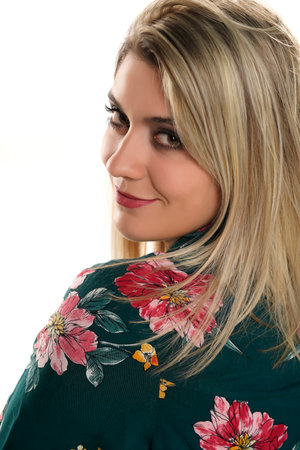portrait of a young beautiful blond woman on white backgroundの写真素材