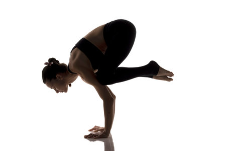 Yoga, sport, training and lifestyle concept - Young woman doing yoga exercise. Portrait of young...