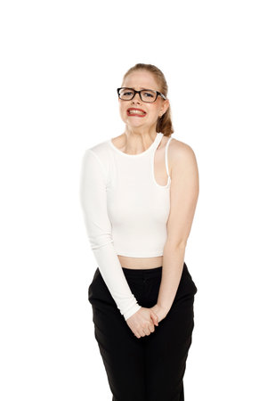 young blond woman need a toilet on white studio backgroundの写真素材