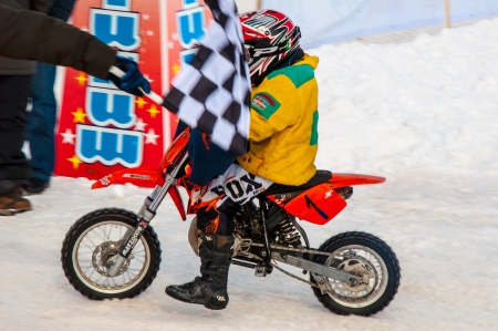 Winter Motocross competitions among childrenのeditorial素材