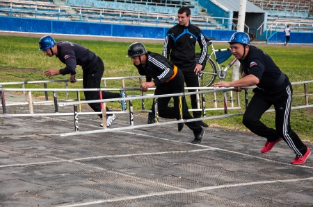 Competitions on fire-applied sport or fire-rescue sport. PENETRATION in 4-floor WINDOW by LADDER ASSAULT.のeditorial素材