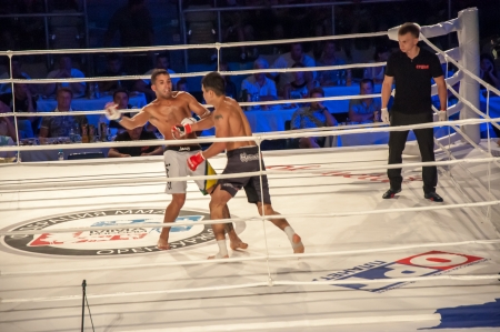 Mixed fighting Championship Edition. 29.06.2013 year, the city of Orenburg. MMA fights without rules. Blue corner Agoni Romero, Spain and in the Red corner, Rinat Kultumanov, Russia. Victory Agoni Romero.のeditorial素材