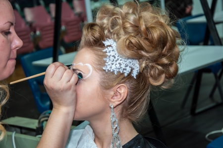 Makeup artist bring make-up girl のeditorial素材