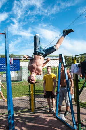 The city of Orenburg, Orenburg oblast, Russia, August 16, 2013. Interregional outdoor youth cultural and Sports Festival, Street Life 2013. Street WorkOutのeditorial素材