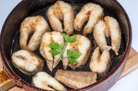 Fried fish with herbs and lemon juice