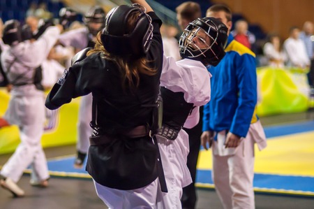ORENBURG, ORENBURG region, RUSSIA, 11 may, 2014 year. Competition between girls on Kobudo Eastern combat martial artのeditorial素材