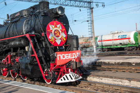 ORENBURG, ORENBURG region, RUSSIA, 6 may, 2014 year. Vintage steam locomotive at the station of...