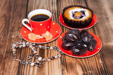 Coffee Cup dates cake and crystal sugar navatの写真素材