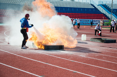 ORENBURG, ORENBURG region, RUSSIA, 7 August, 2014 year. 23 Championship The Ministry of emergency situations of Russia fire-applied sports. Fire relay race のeditorial素材